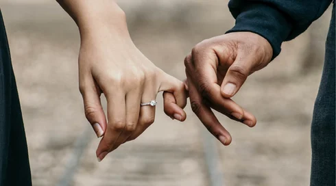 Couple+holding+hands+marriage+allowance